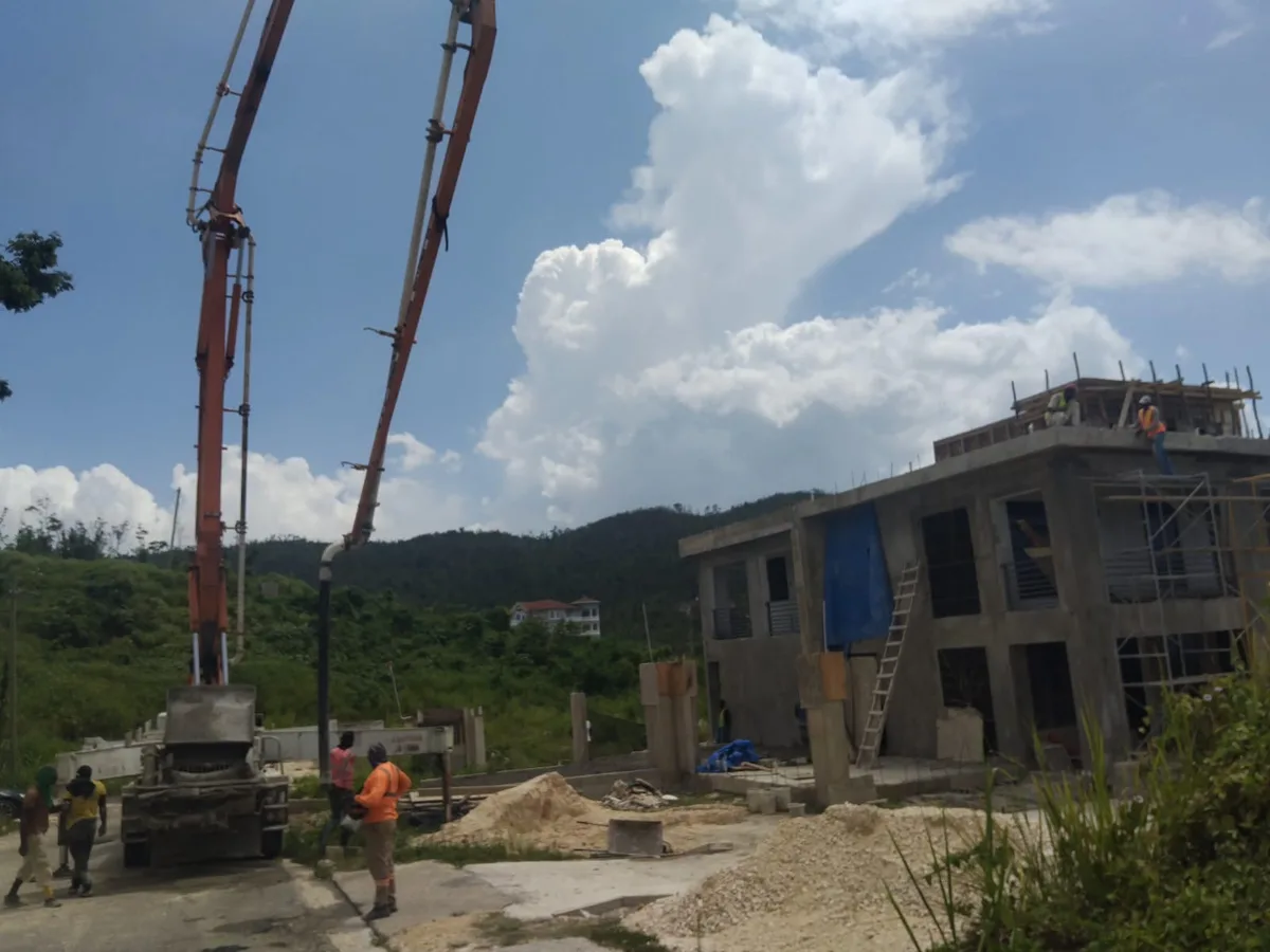 Commercial building concrete pour with pump truck, Jamaica
